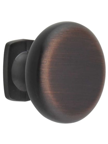 Belcastel Flat-Bottom Cabinet Knob - 1 3/8 inch Diameter in Brushed Oil Rubbed Bronze.